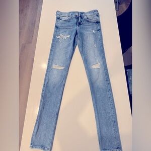 H&M Blue Skinny Jeans with Vintage Distressed Style